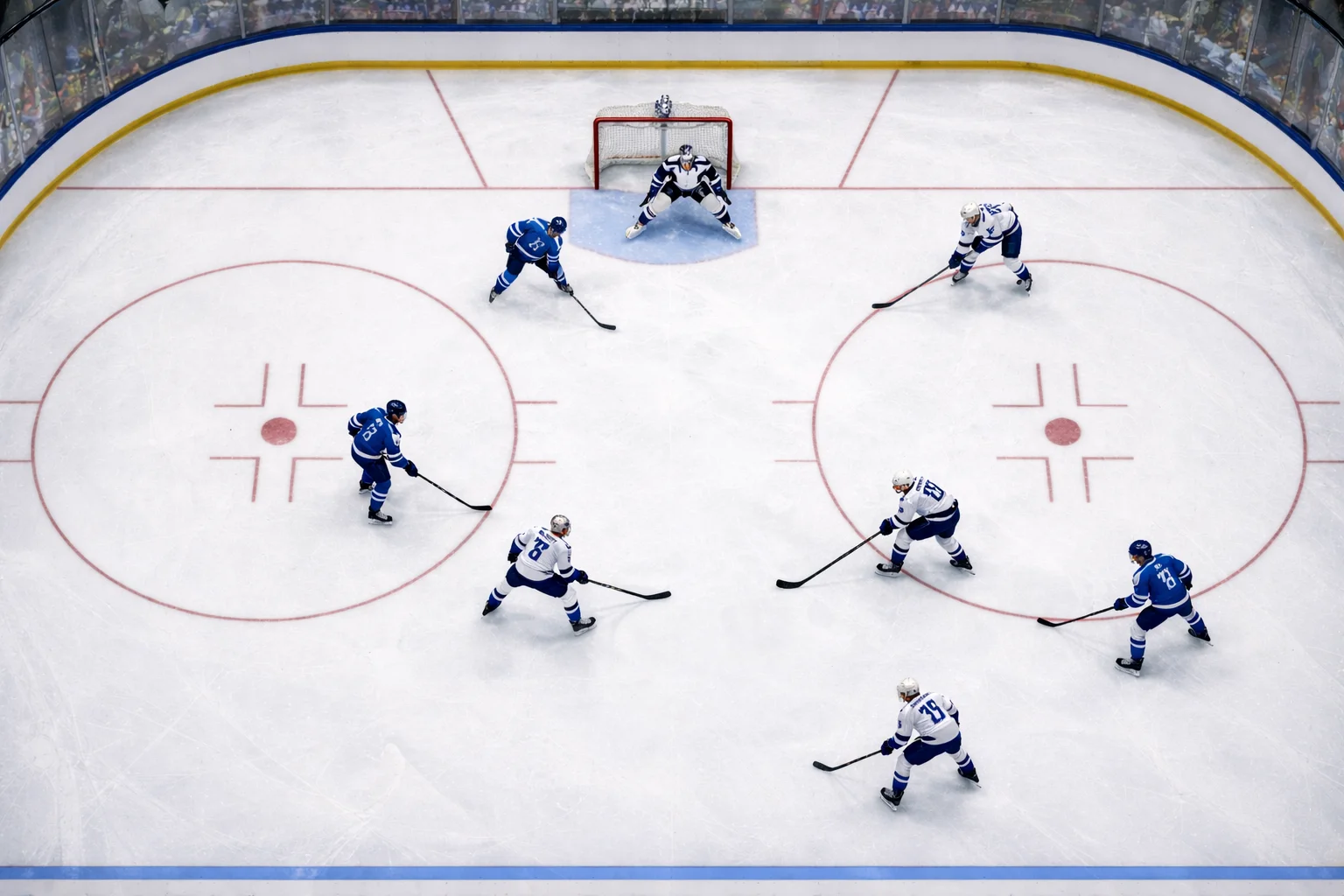Ishockeyrink sedd ovanifrån med spelpuck och klubbor
